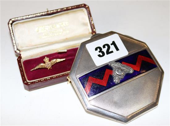 Silver military compact and gold RAF badge